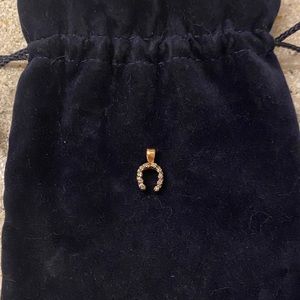 Vintage 1/3 Ct diamond horseshoe pendant in 14K gold. Custom piece.